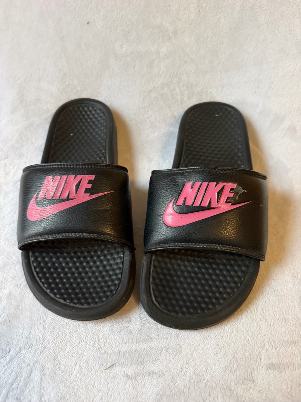 Nike Kids Black Slide Sandals with Pink Swoosh Logo